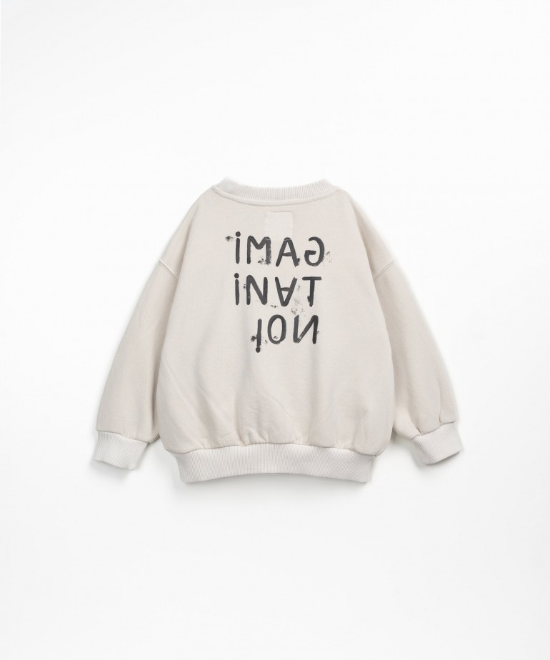 Maglia con immagine sulla schiena