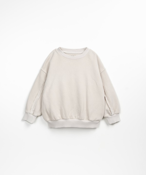 Jersey con dibujo en la espalda