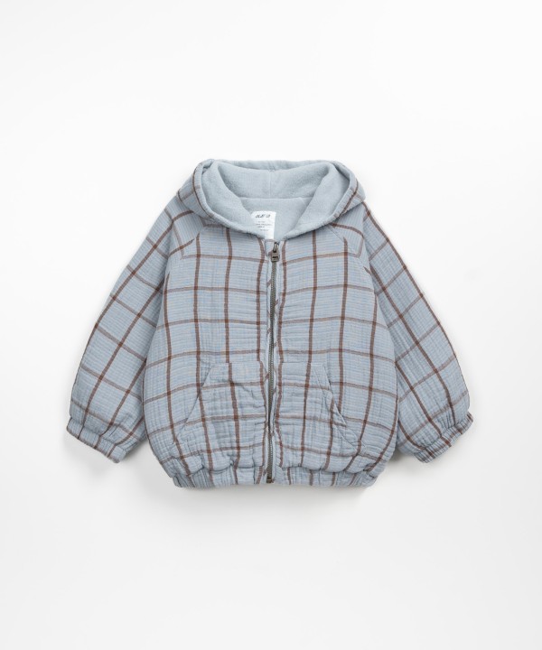 Casaco de tecido com bolsos