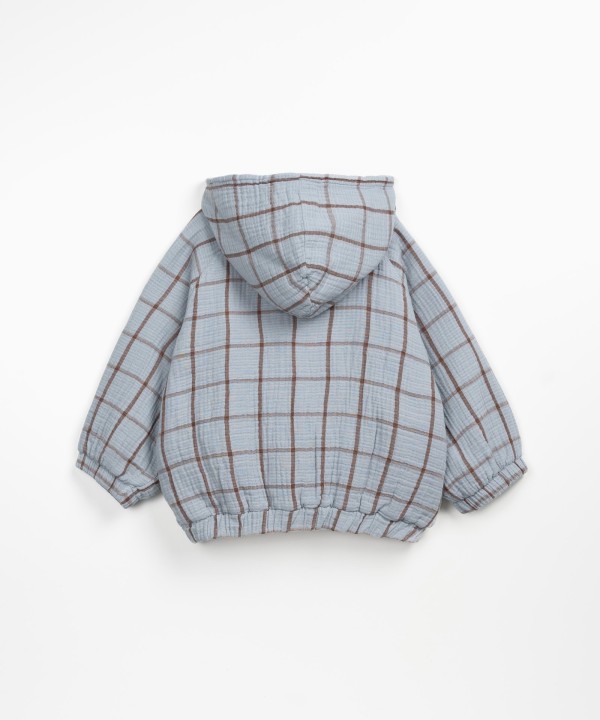 Casaco de tecido com bolsos