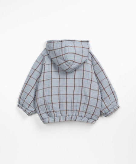 Casaco de tecido com bolsos