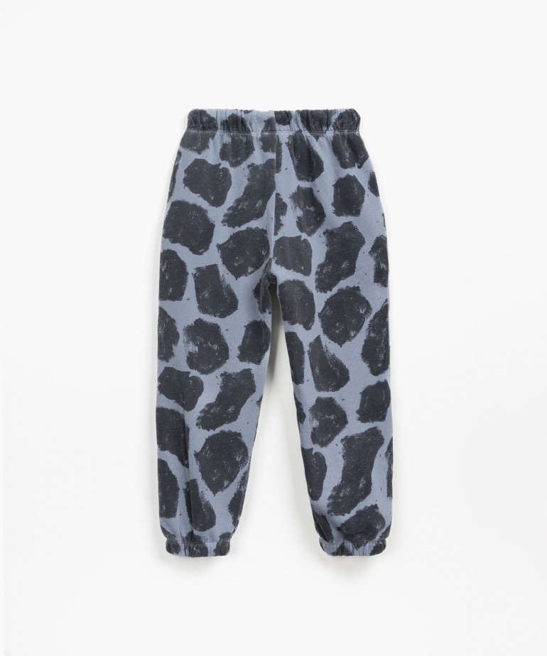Pantaloni con stampa a macchie di giraffa