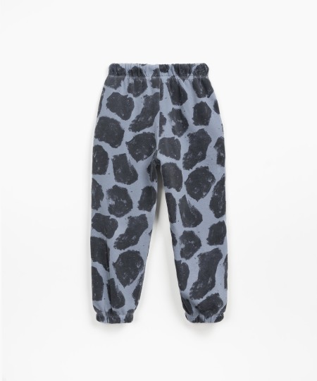 Pantaloni con stampa a macchie di giraffa