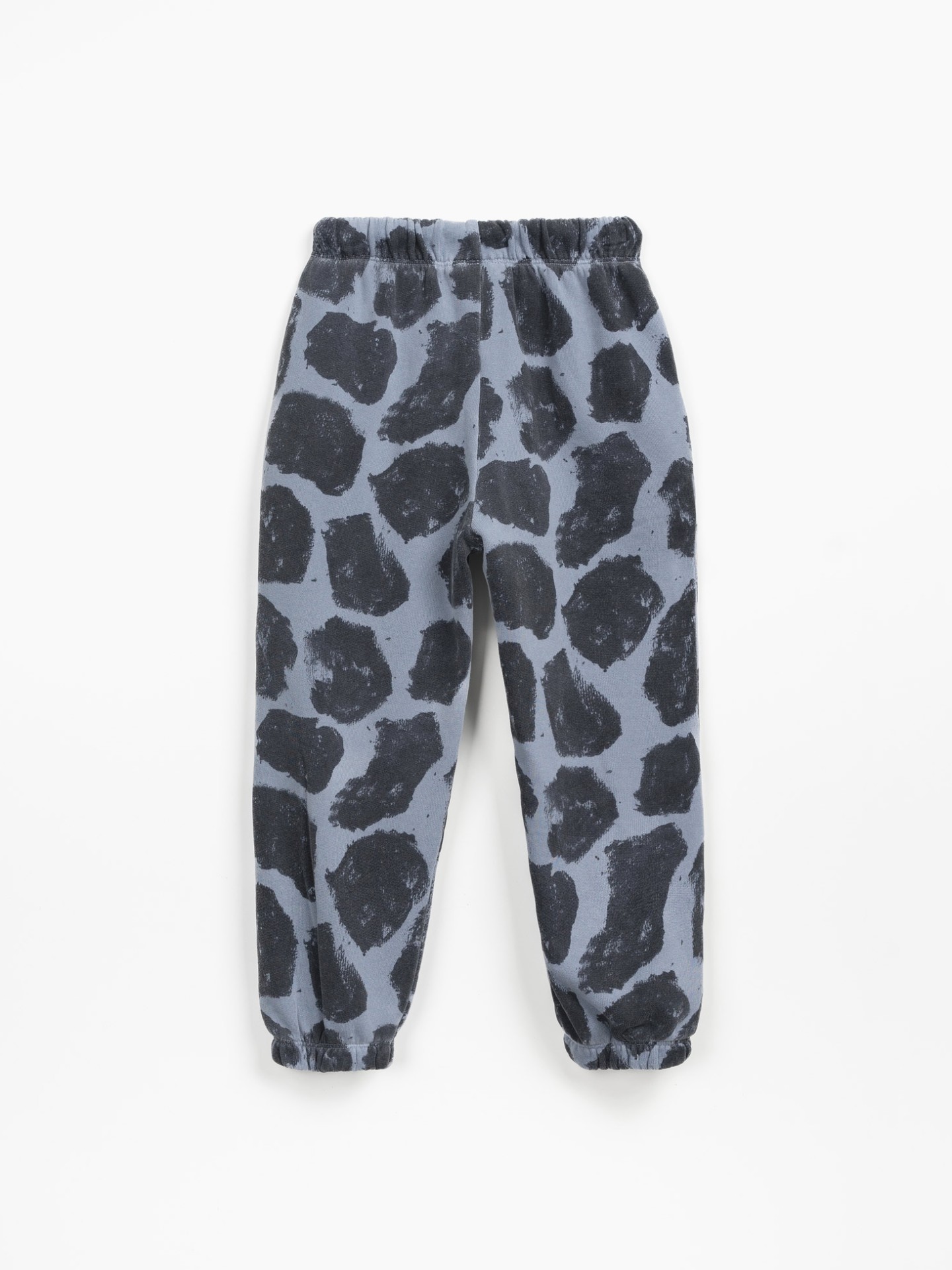 Pants with giraffe spots print