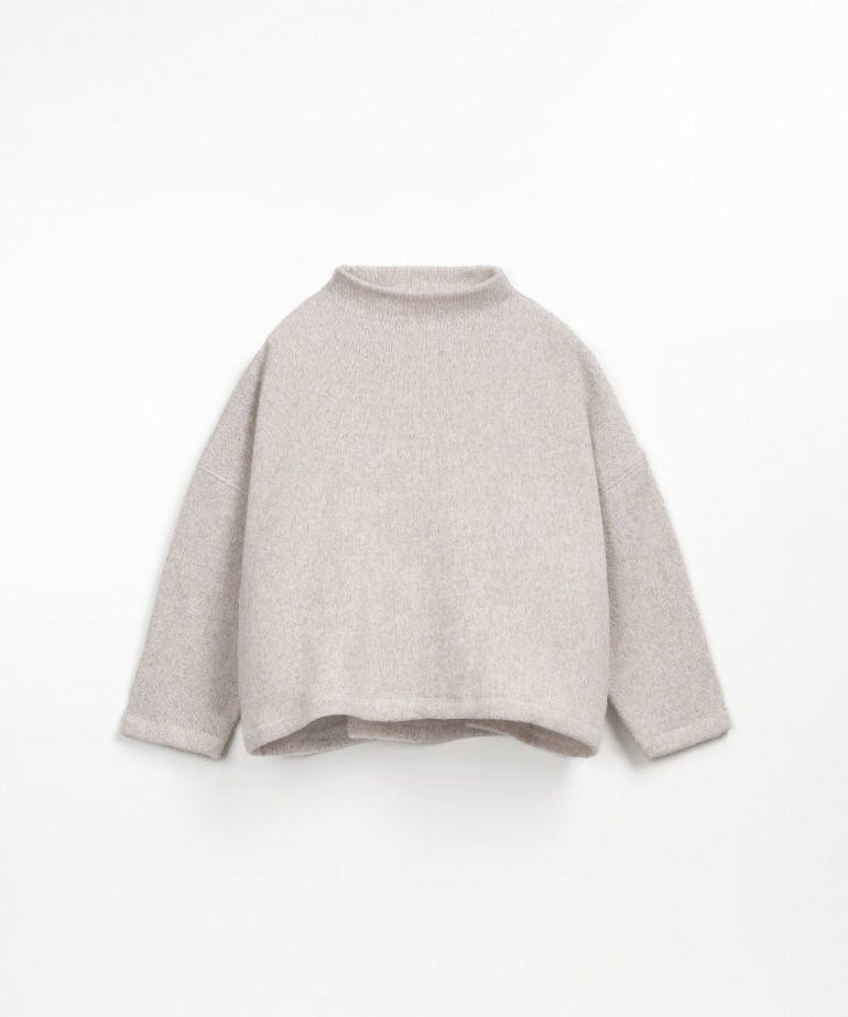 Sweater with mock neck and dropped shoulders