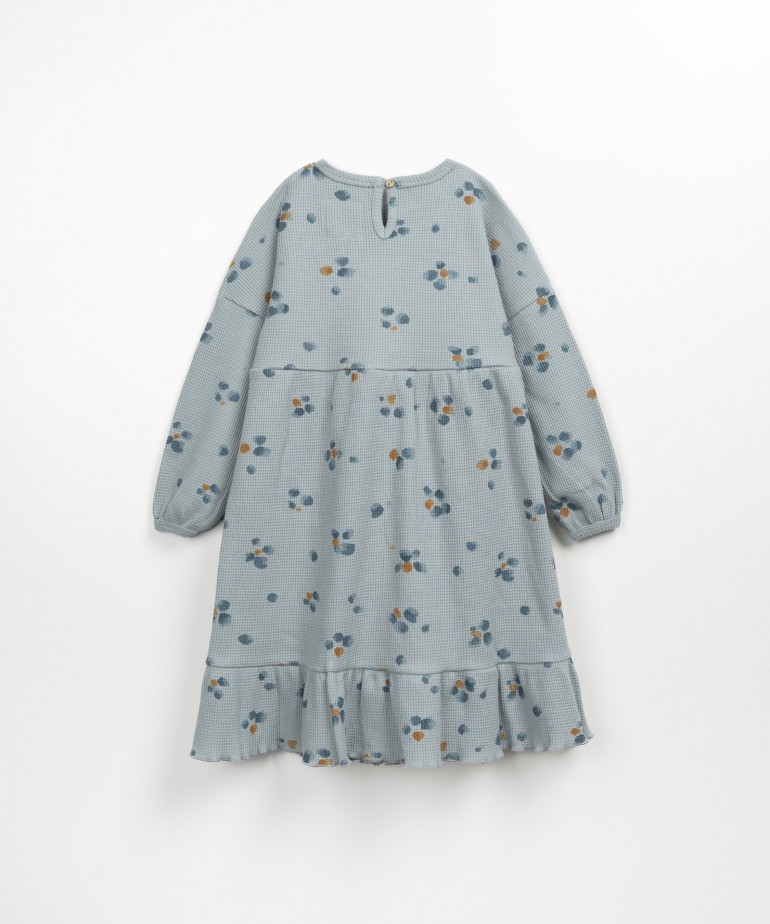 Dress with a frill at the bottom