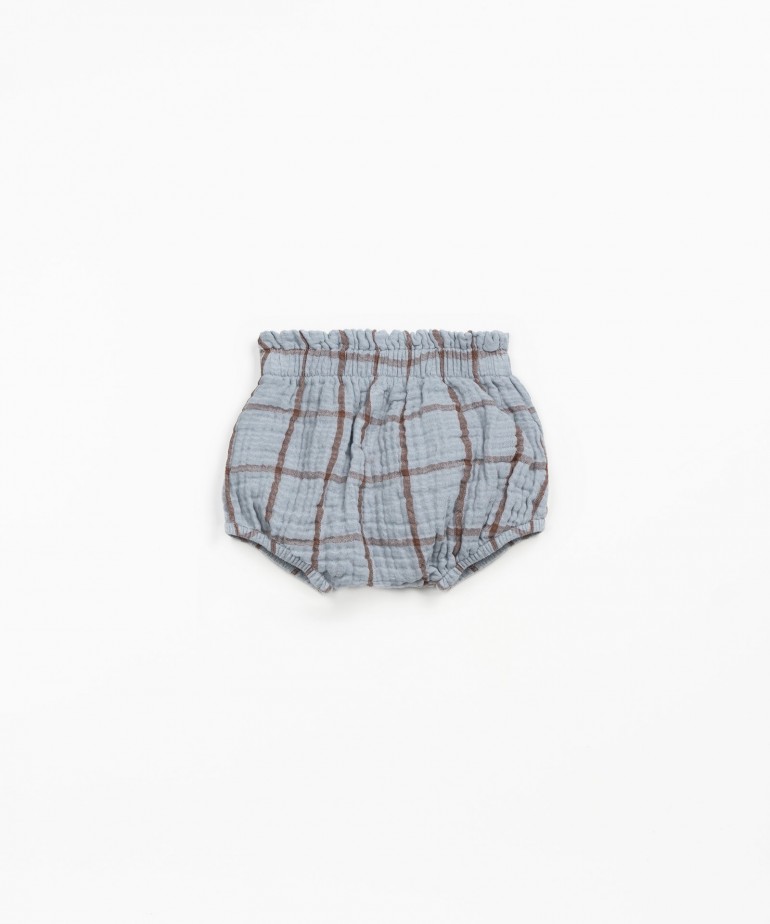 Pantaloncini con motivo a scacchi