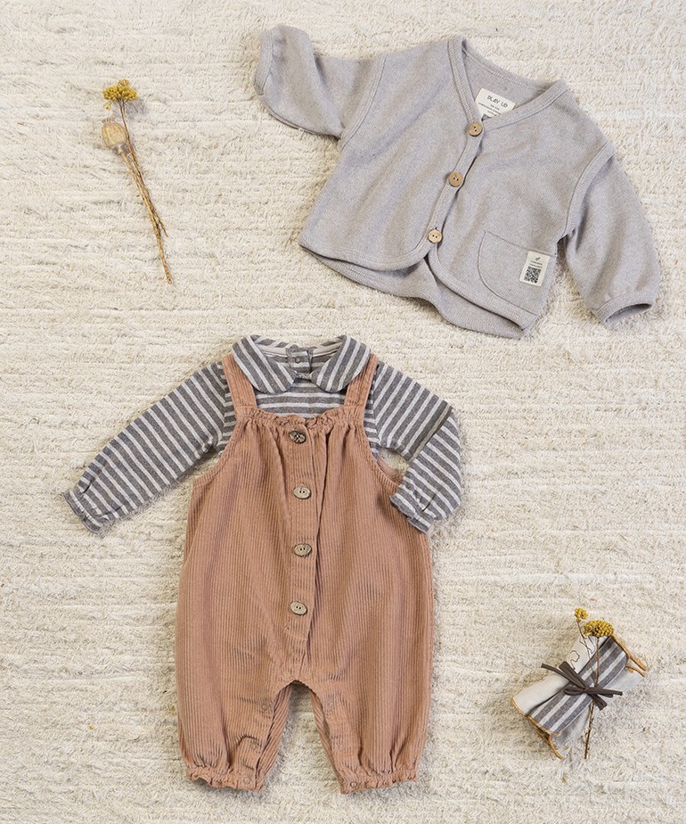 Corduroy jumpsuit with coconut button opening