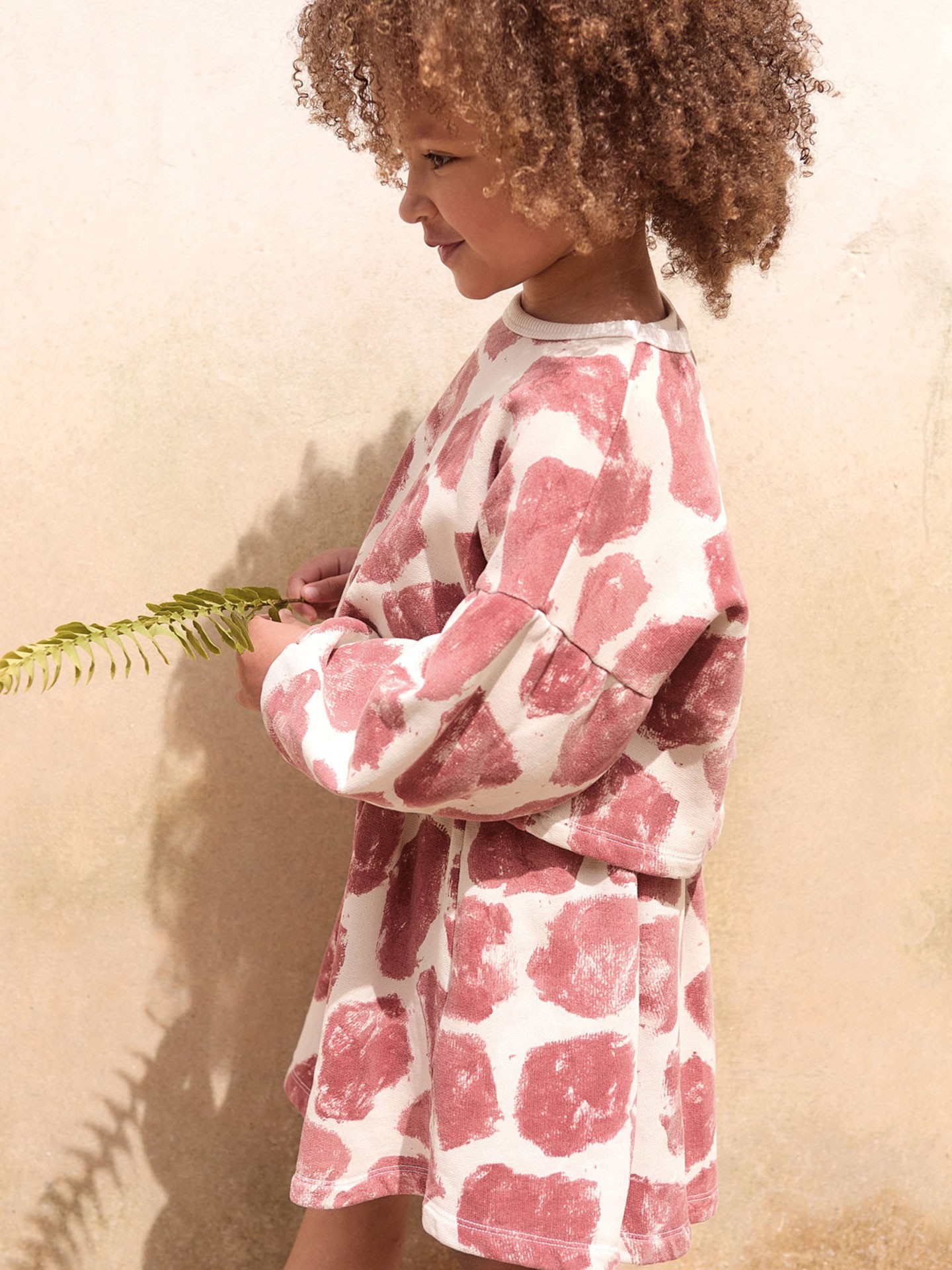 Jersey con estampado de manchas de jirafa con fibras naturales