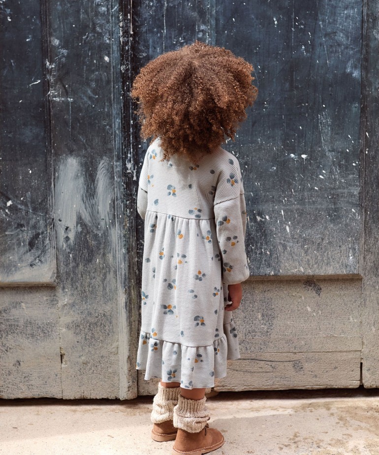 Dress with a frill at the bottom