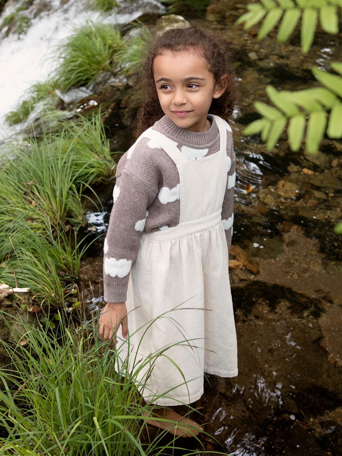 Corduroy dress with opening at the back