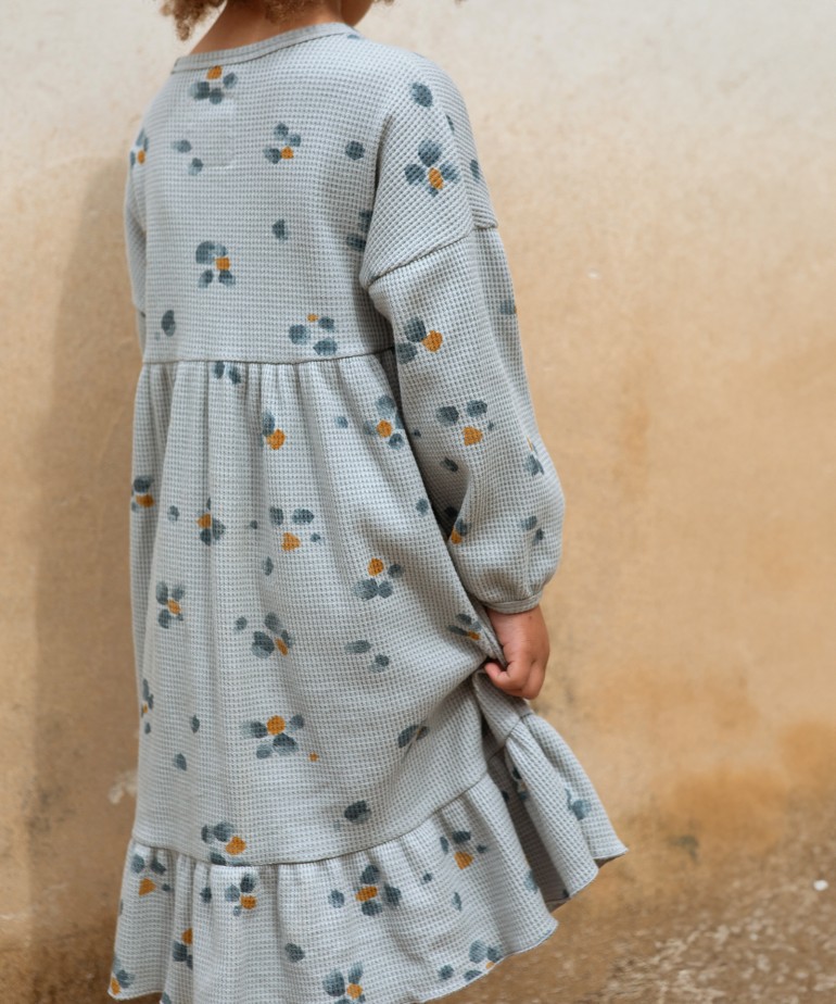 Dress with a frill at the bottom