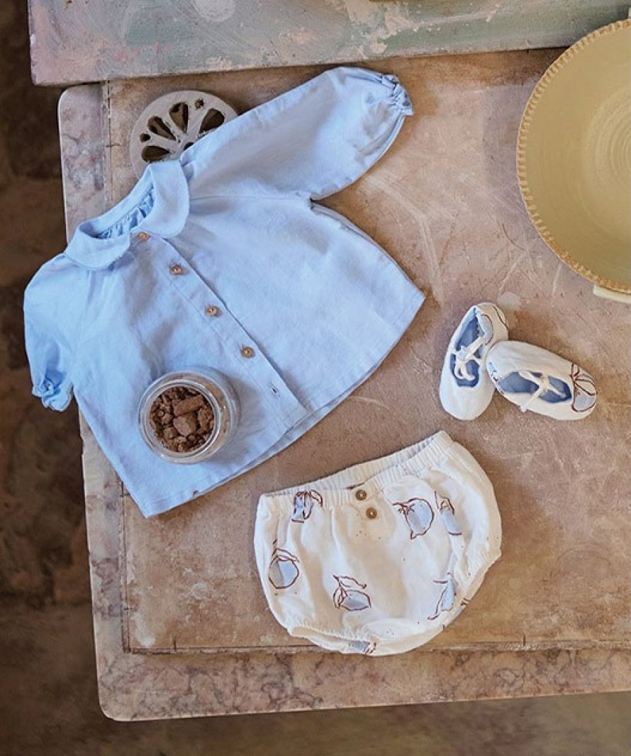 Blusa de tecido em linho e algodo orgnico com botes de coco