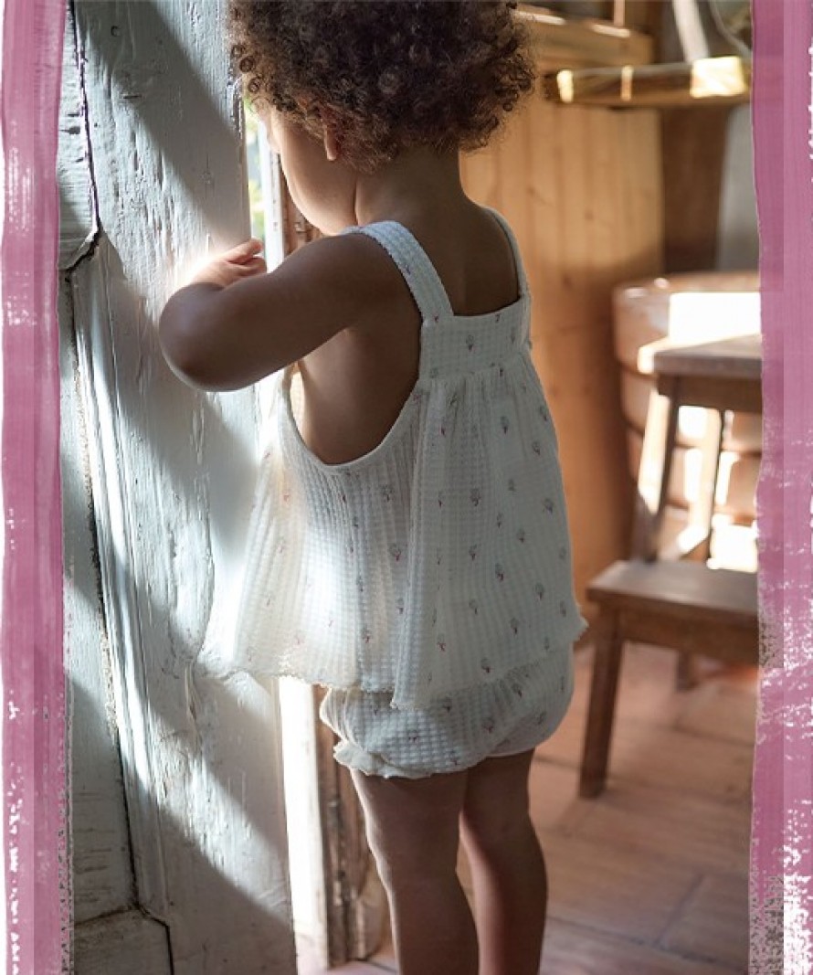 Floral knit top with coconut buttons