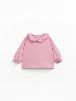 Knitted sweater with a blend of organic and recycled cotton