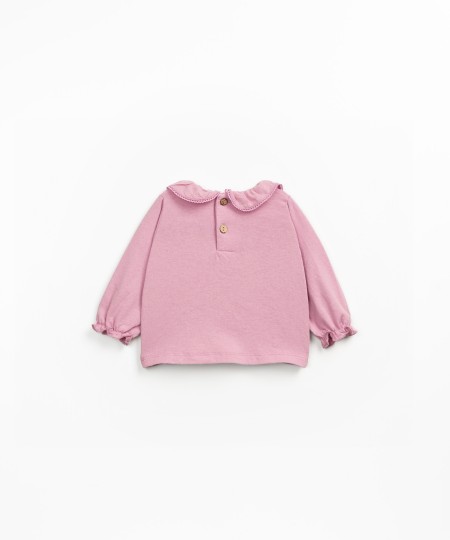 Knitted sweater with a blend of organic and recycled cotton