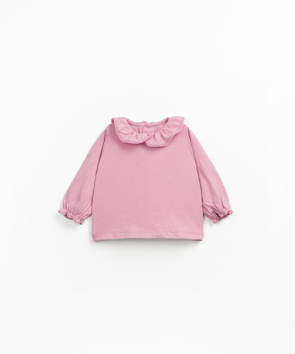 Knitted sweater with a blend of organic and recycled cotton