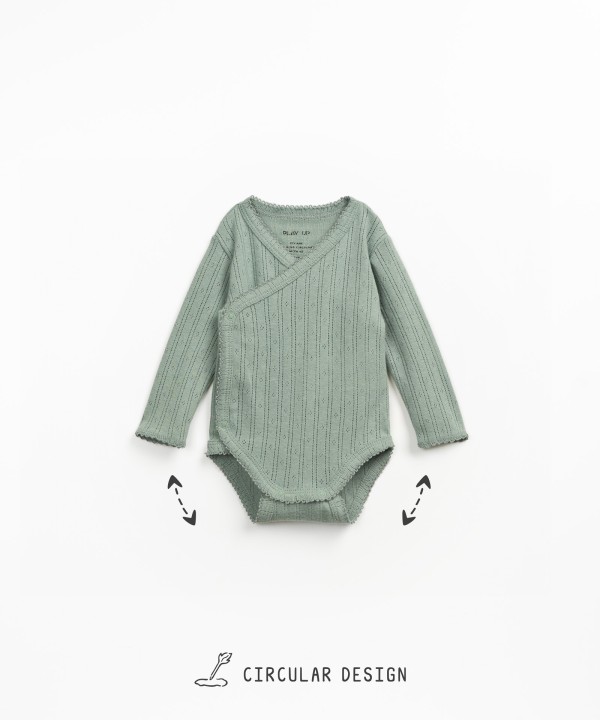 Bodysuit with crossover opening