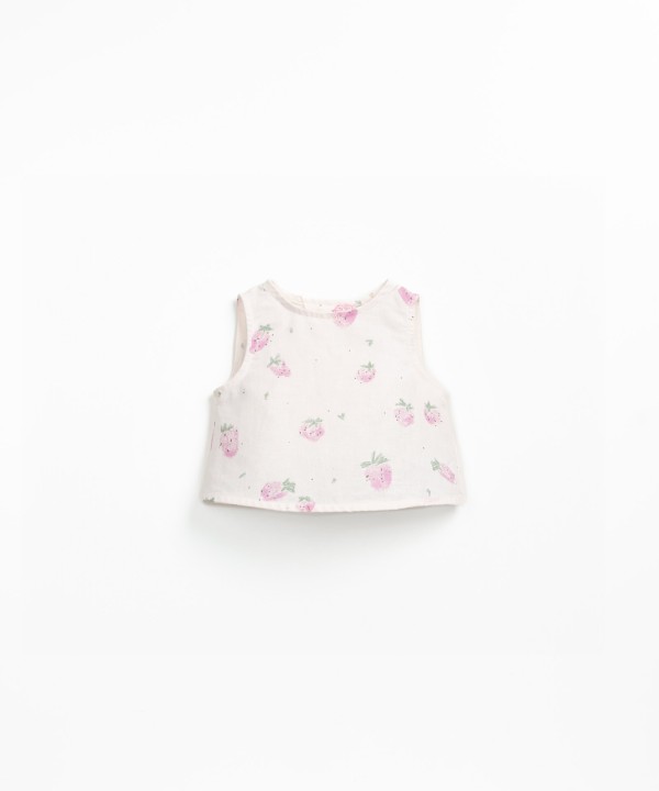 Sleeveless blouse with strawberry print