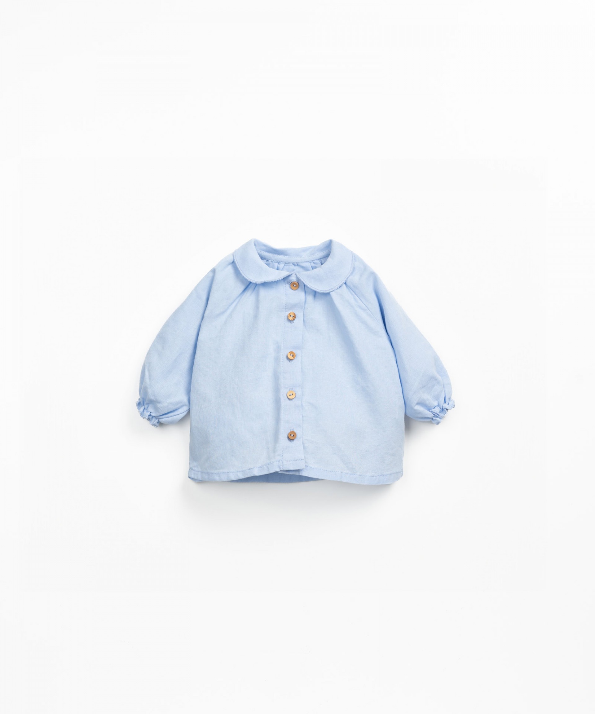 Blusa em linho e algodo orgnico com botes de coco