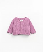 Knitted jacket with coconut buttons