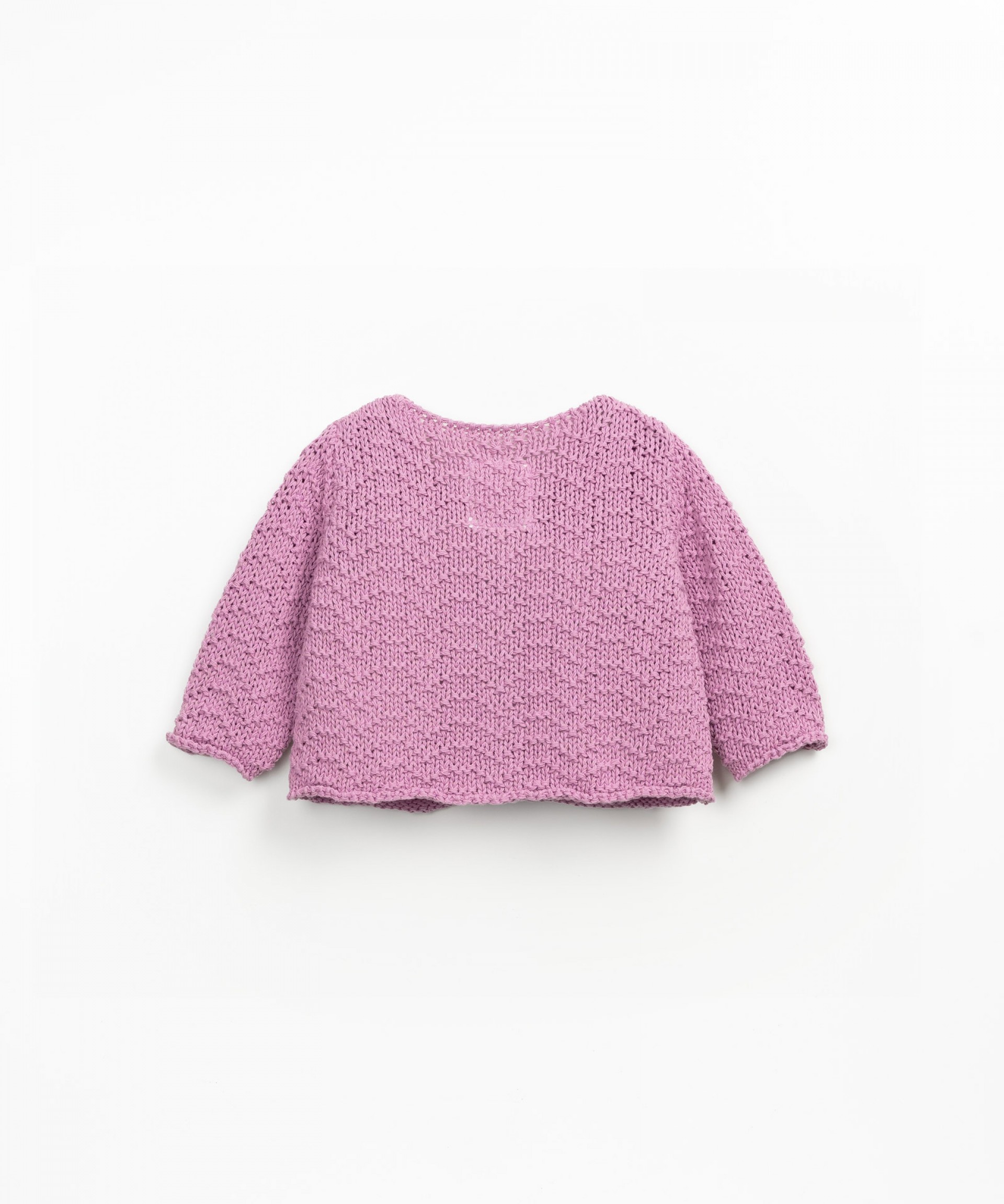 Knitted jacket with coconut buttons