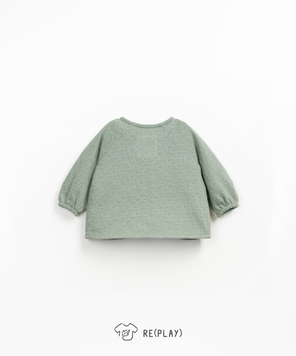 Knitted jacket with Re(Play) yarn