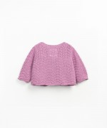 Knitted jacket with coconut buttons