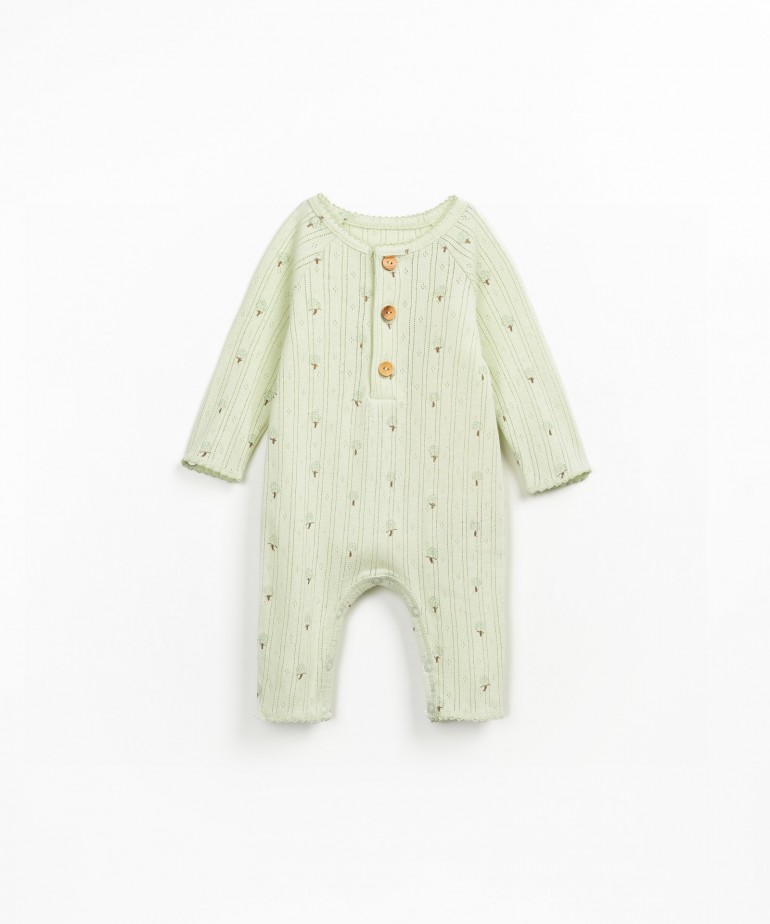 Ajour jumpsuit in organic and recycled cotton with floral pattern