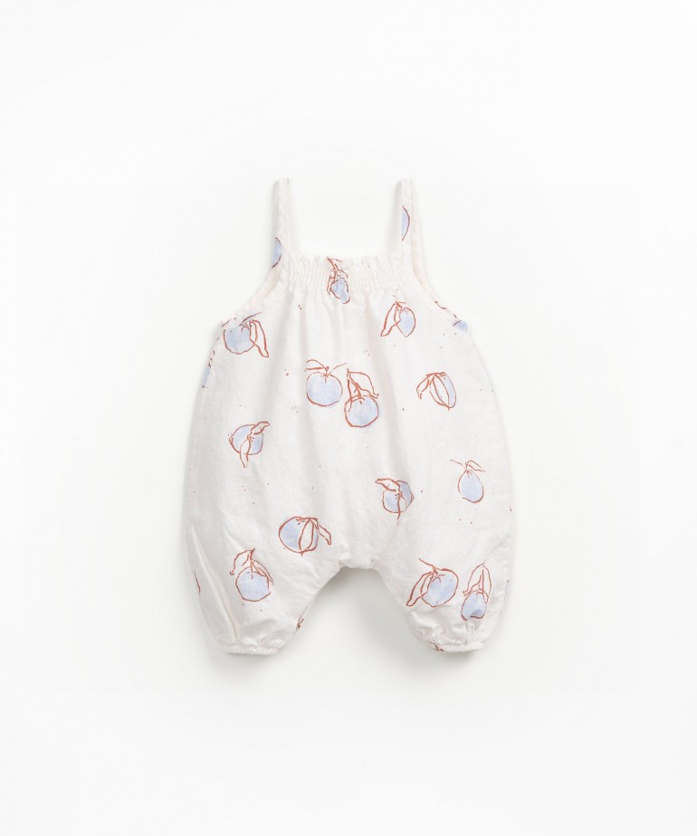 Linen and organic cotton jumpsuit with strawberry print