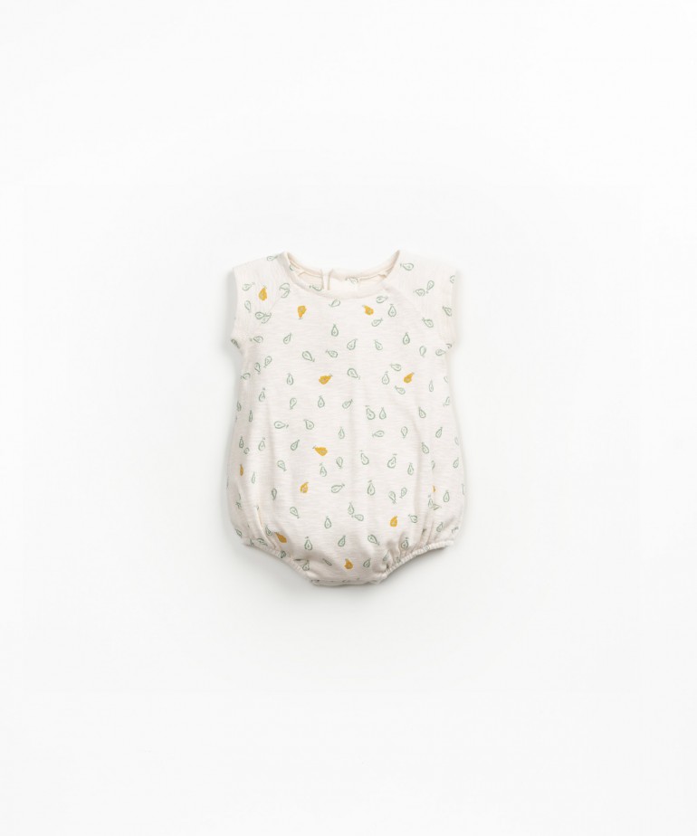 Organic cotton jumpsuit with floral print and coconut buttons