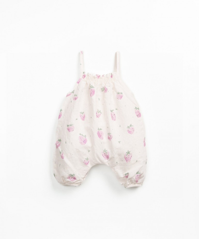 Linen and organic cotton jumpsuit with strawberry print