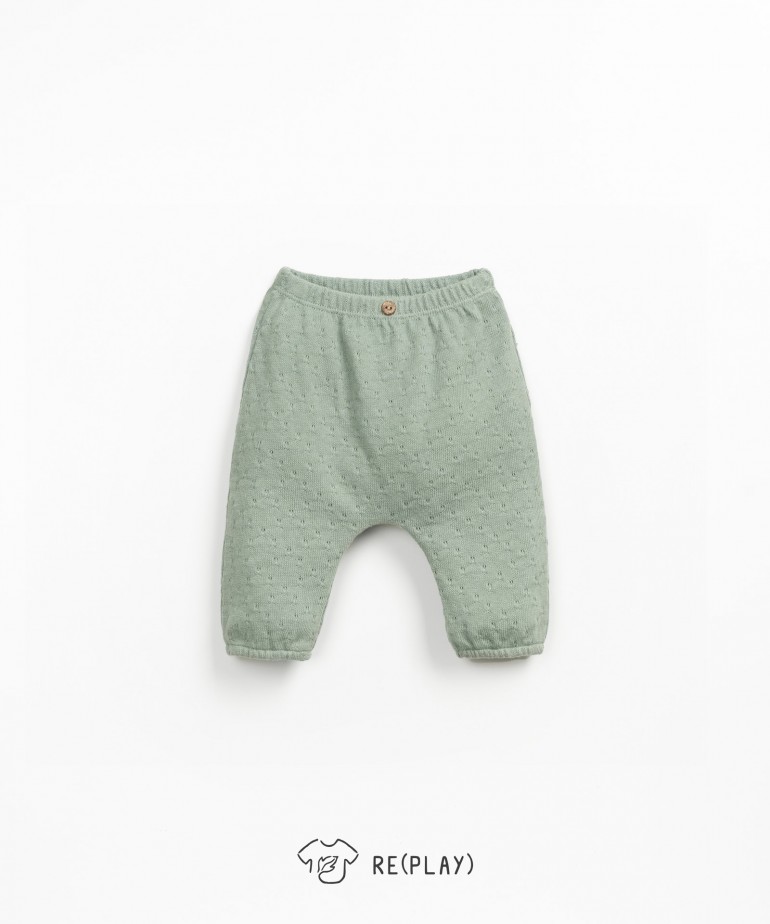 Trousers with elastic leg openings