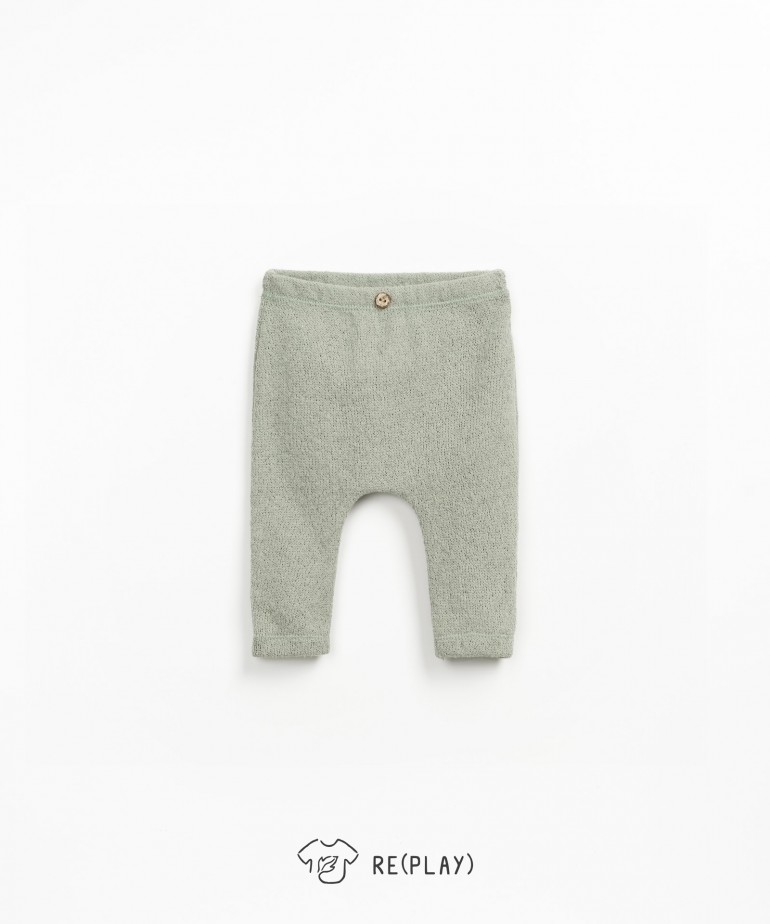 Leggings in cotton and recycled polyester blend with coconut button