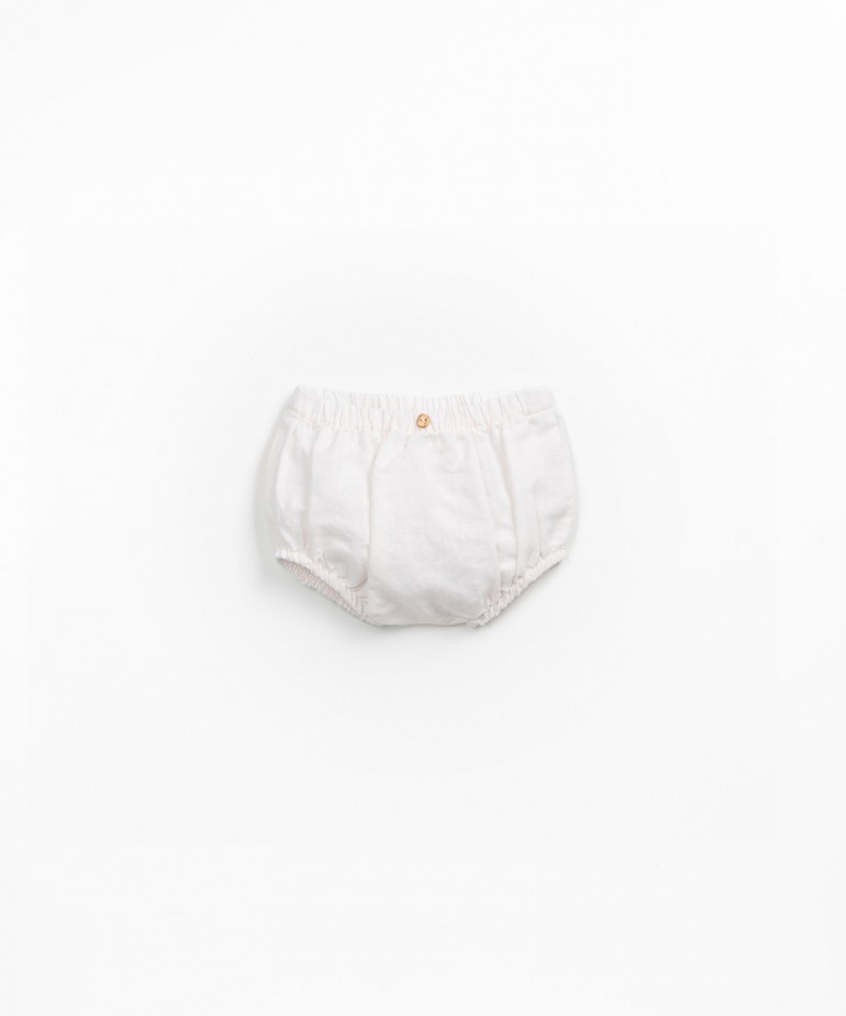 Wide shorts in linen and organic cotton with coconut button