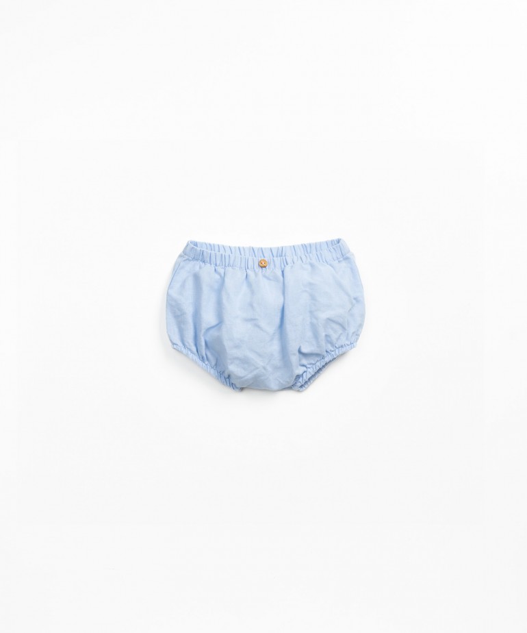 Wide shorts in linen and organic cotton with coconut button