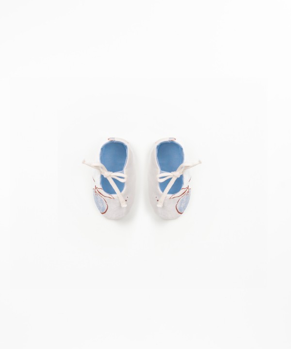 Fabric shoes with orange print