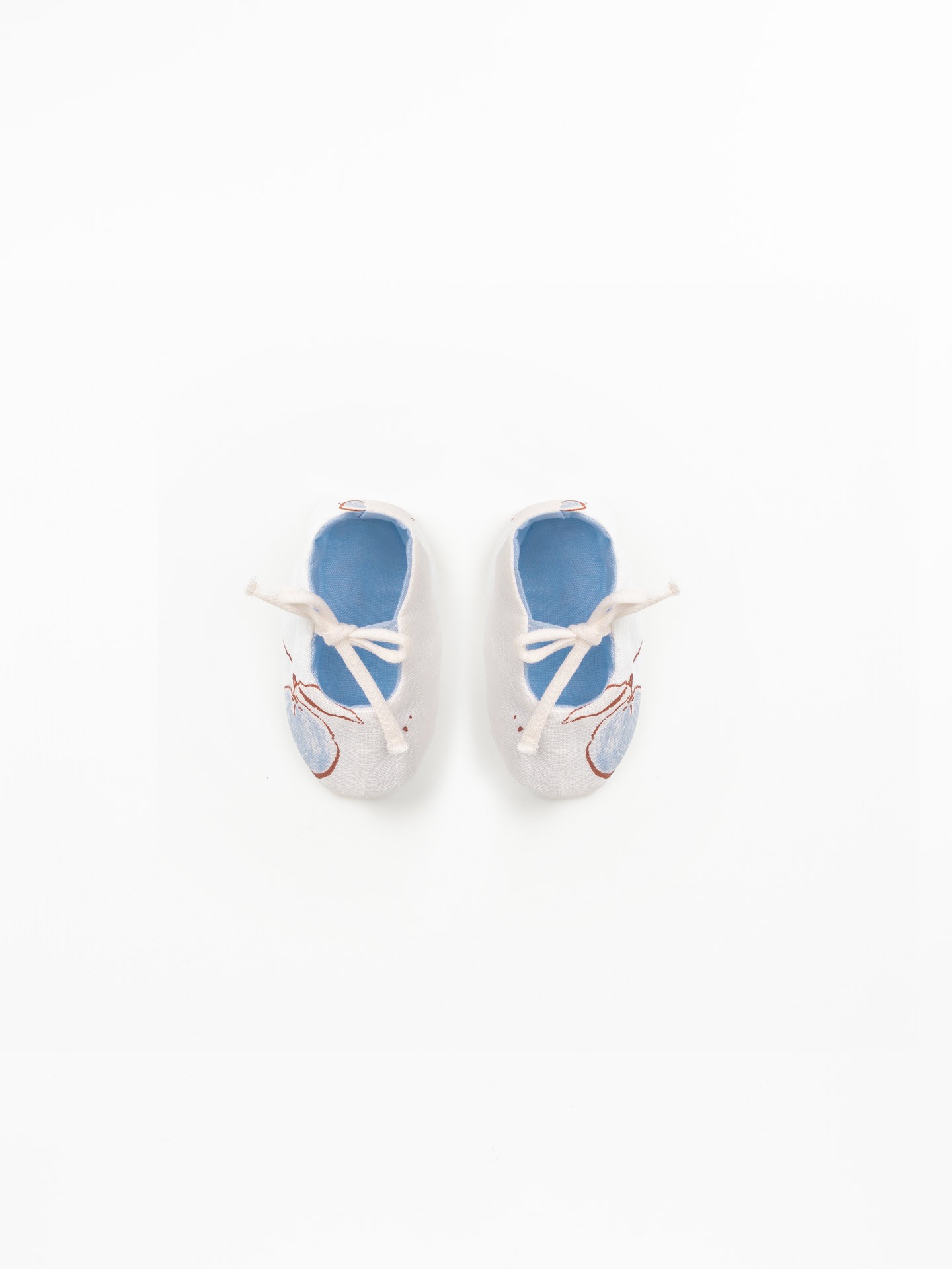 Scarpe in tessuto con stampa di arance