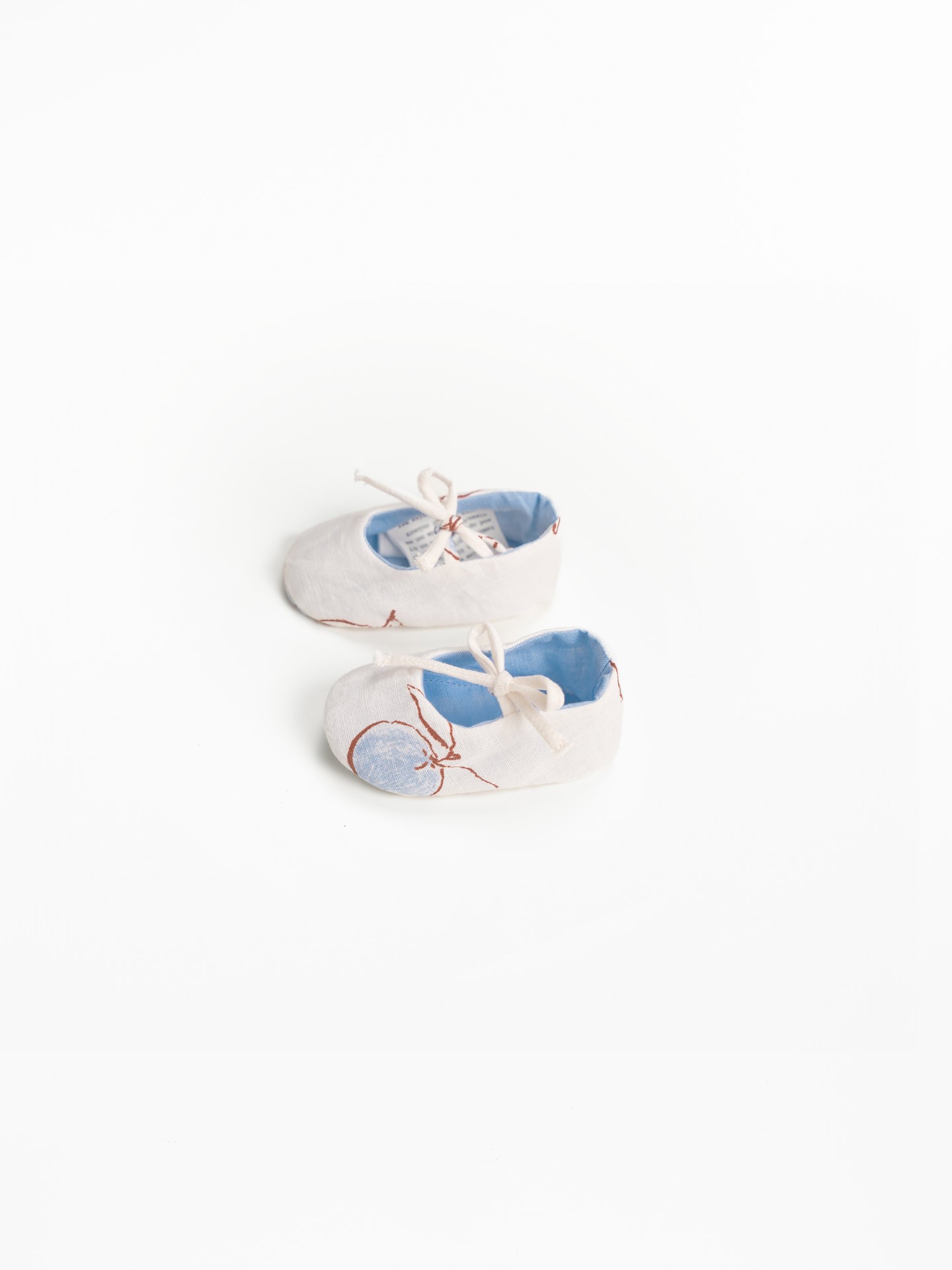 Scarpe in tessuto con stampa di arance