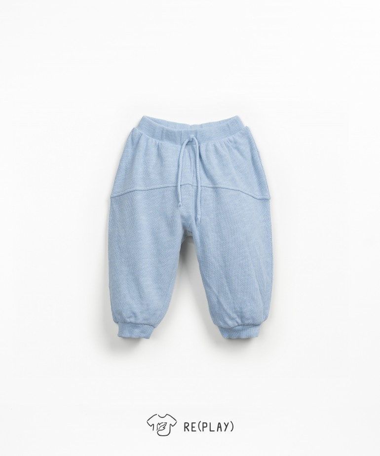 Jersey trousers with decorative drawstring