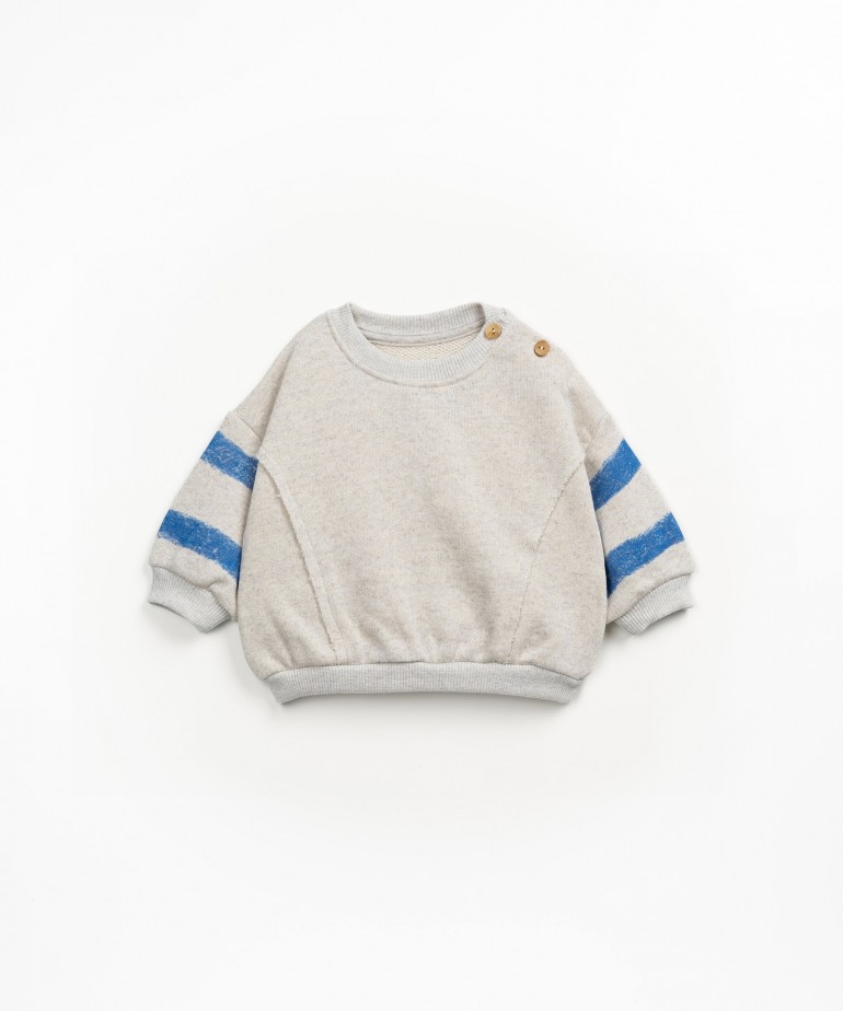Sweatshirt with coconut buttons and striped cotton with recycled fibers