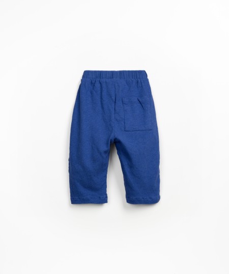 Calça com mistura de malha e tecido