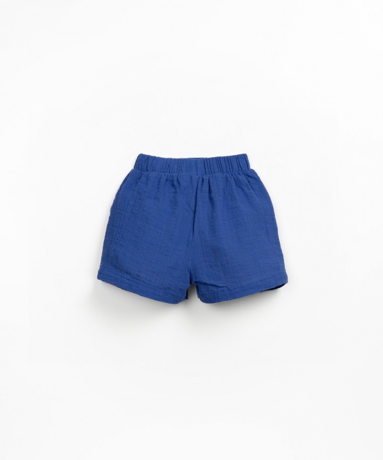 Fabric shorts with pockets