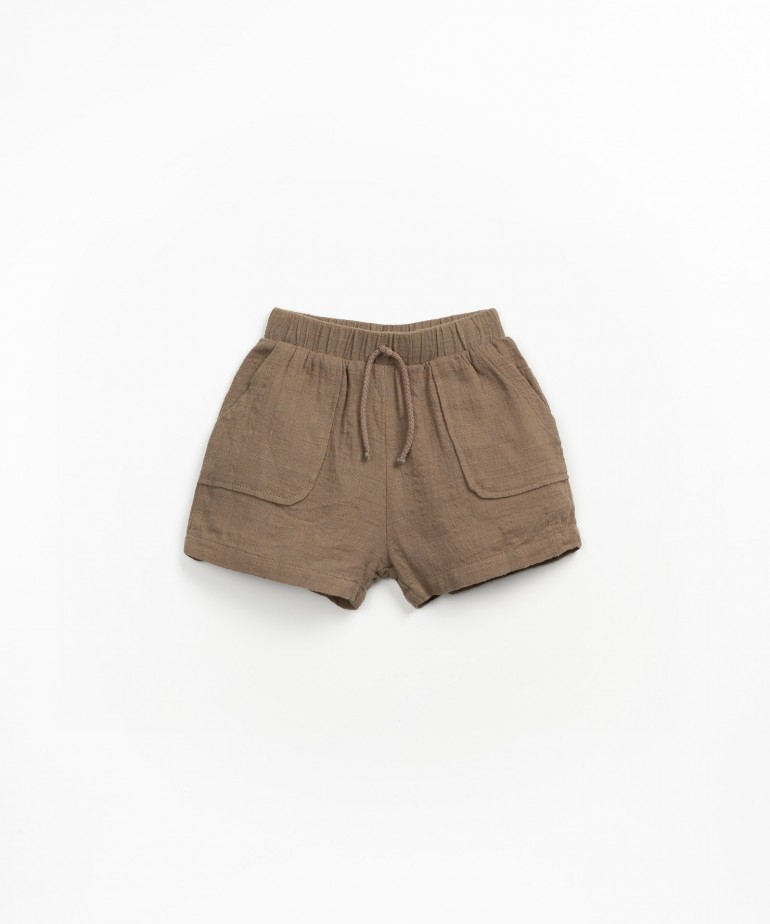 Pantaloncini in tessuto con tasche
