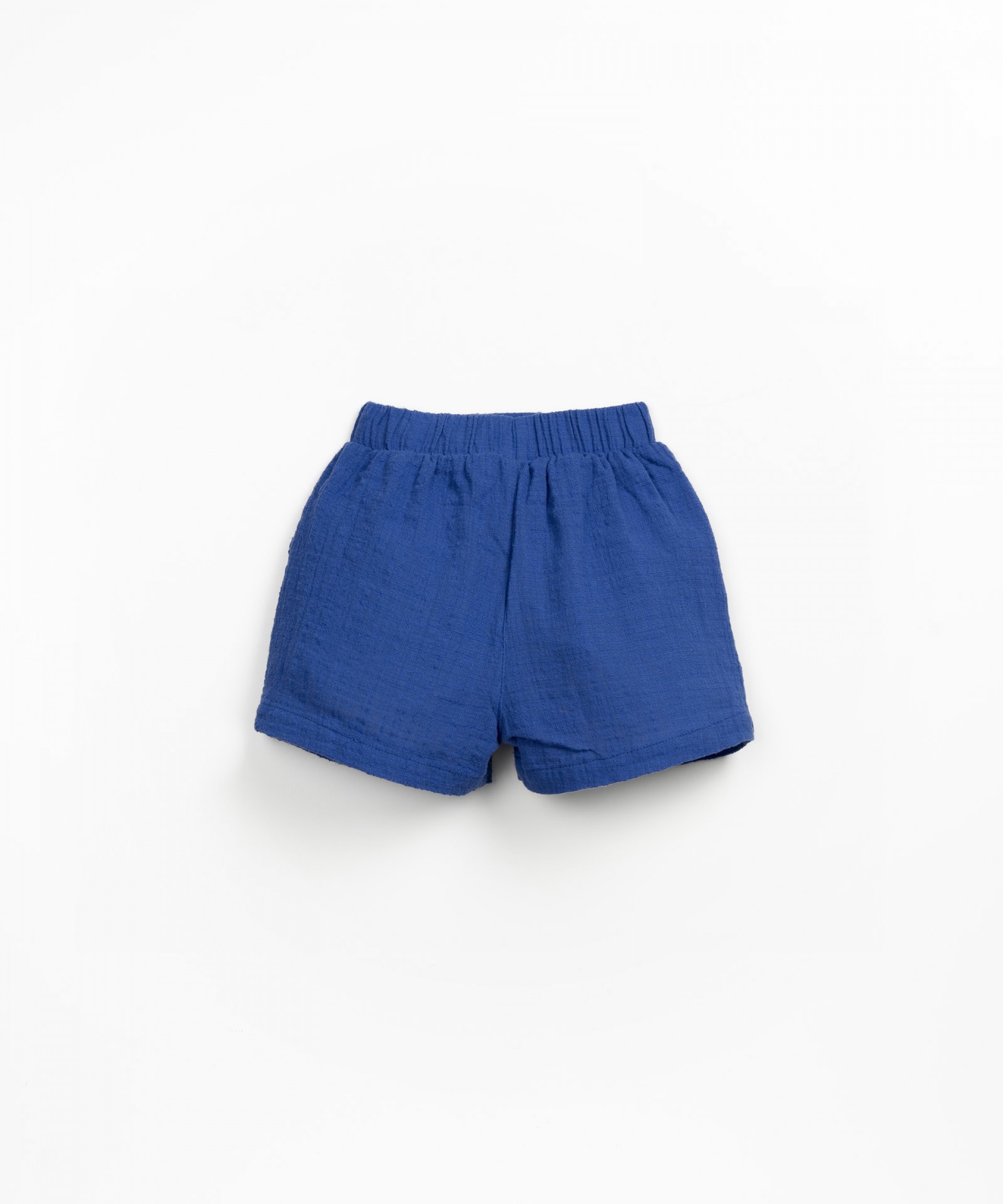 Pantaln corto con cinturilla elstica y cordn decorativo