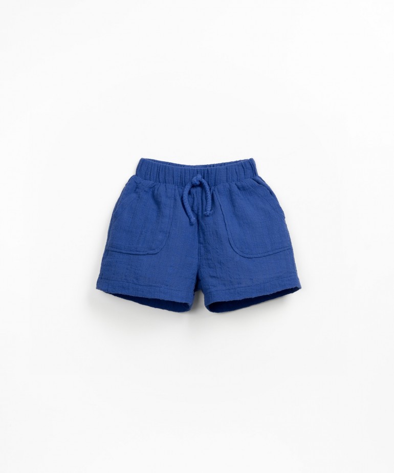 Fabric shorts with pockets