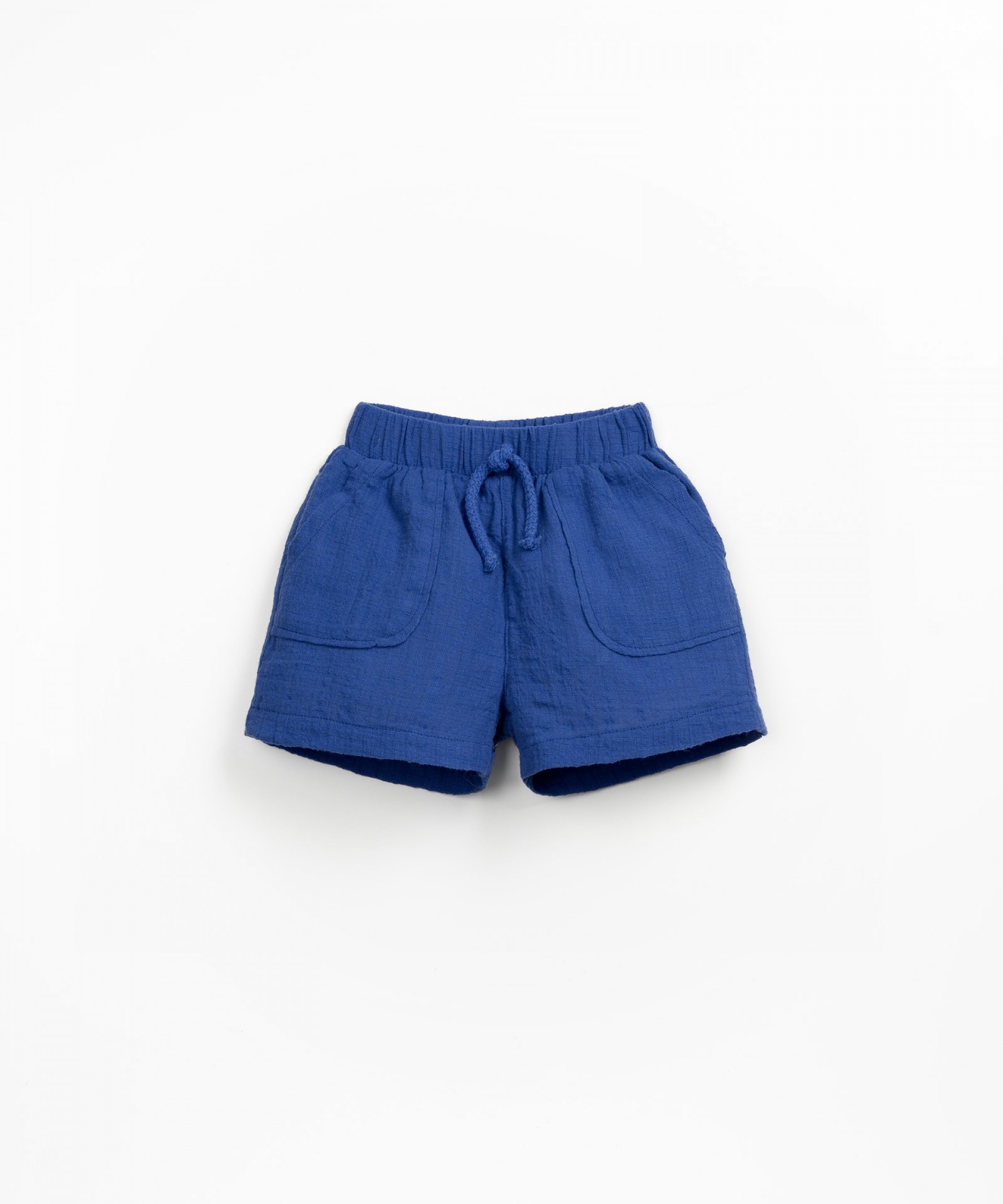 Pantaln corto con cinturilla elstica y cordn decorativo
