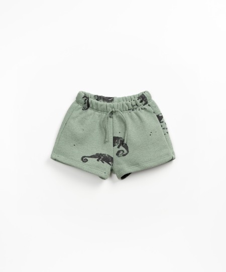 Cal��o de malha com estampado de camale�es

