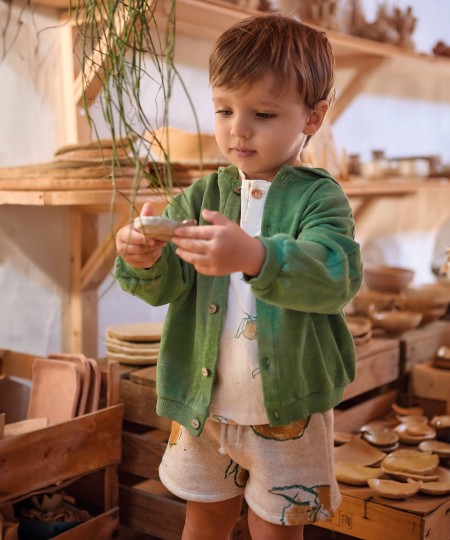 Pantalón corto de punto con estampado de naranjas