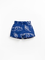 Swim shorts with leaf print